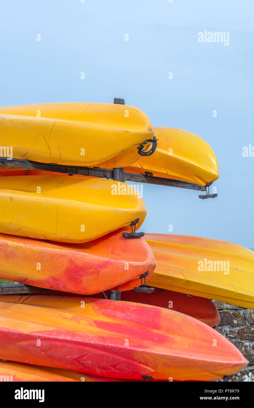 Stacked sea kayaks Stock Photo