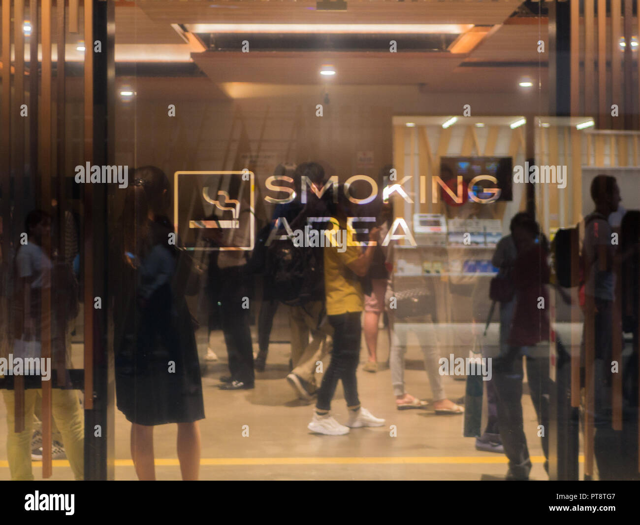 A modern smoking area near Shinjuku station in Tokyo, Japan. Stock Photo