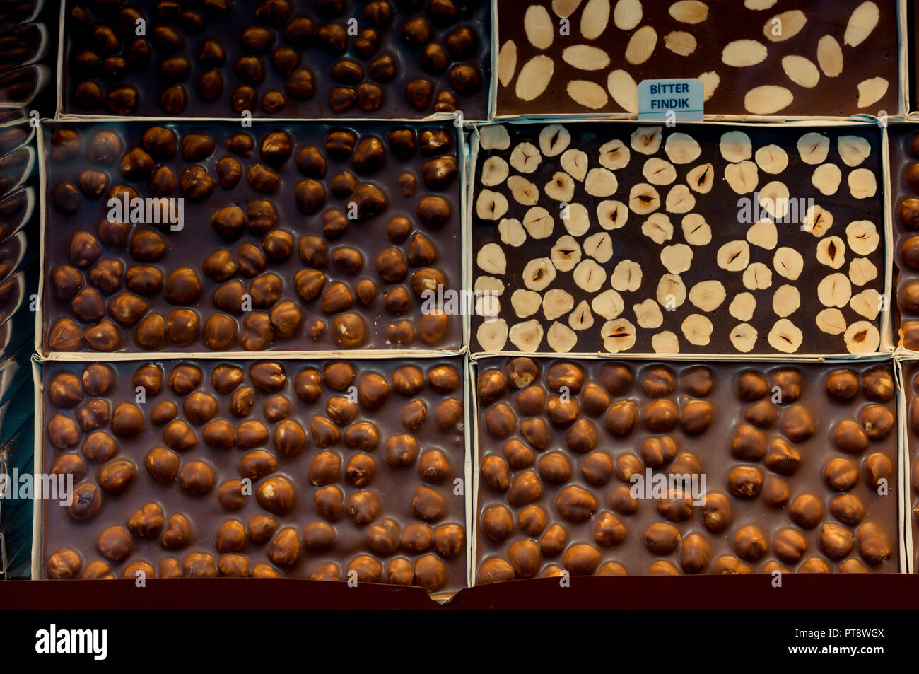 handmade brown chocolate bars with nut in view Stock Photo