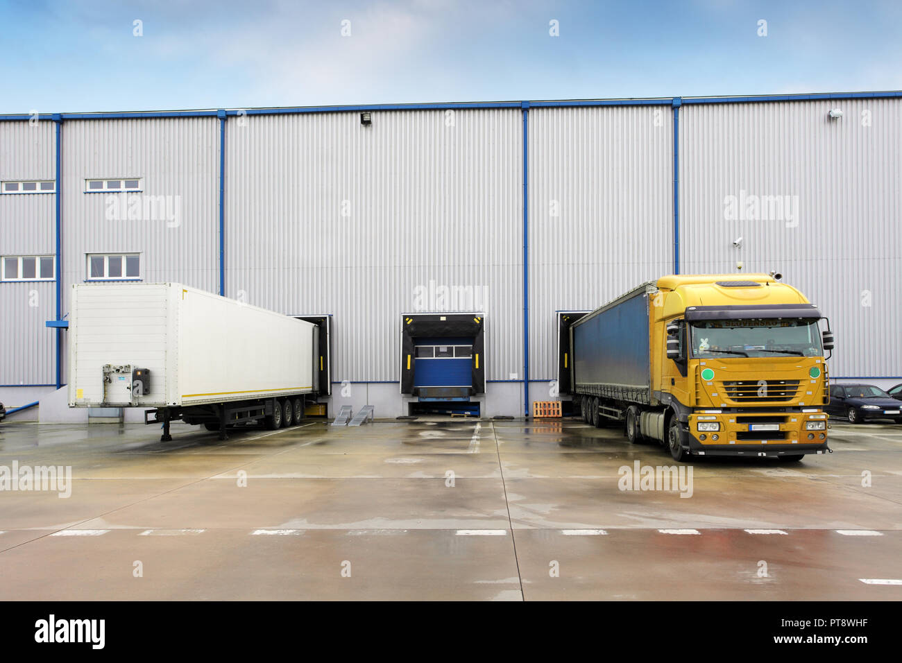 Loading docks in warehouse with truck Stock Photo