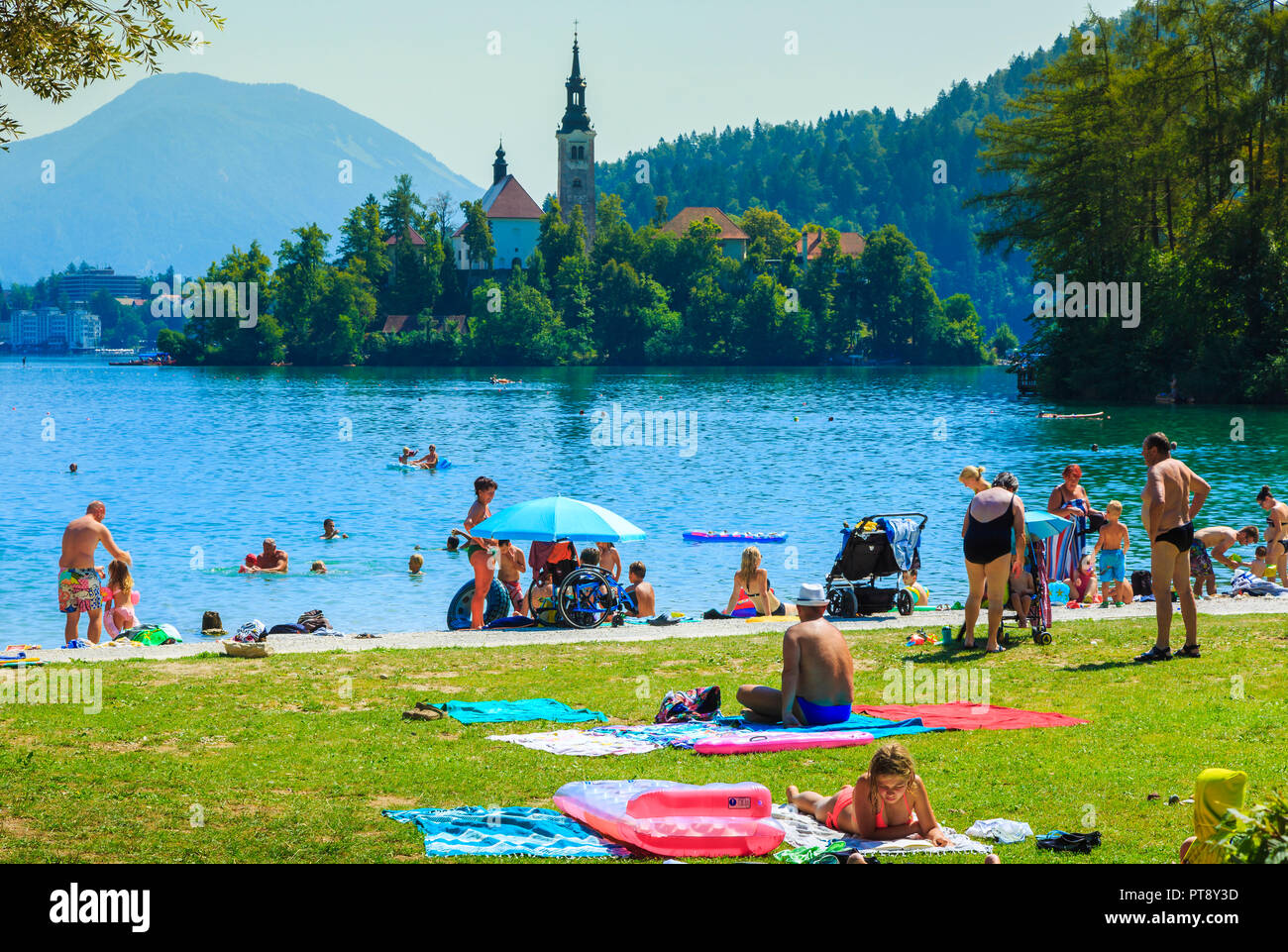 Sunbathers in a lake. Stock Photo