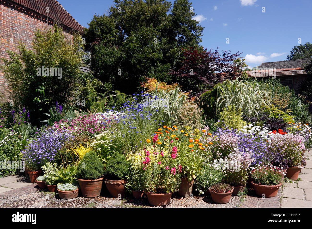 SUMMER FLOWERING GARDEN POTS AND CONTAINERS Stock Photo