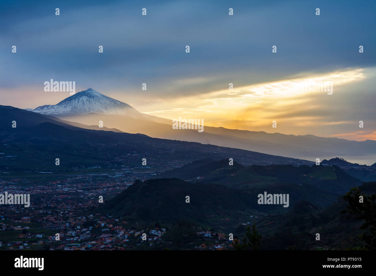 Sunset over Tenerife landscape with volcano Pico del Teide in snow. Winter in Canary Island Stock Photo