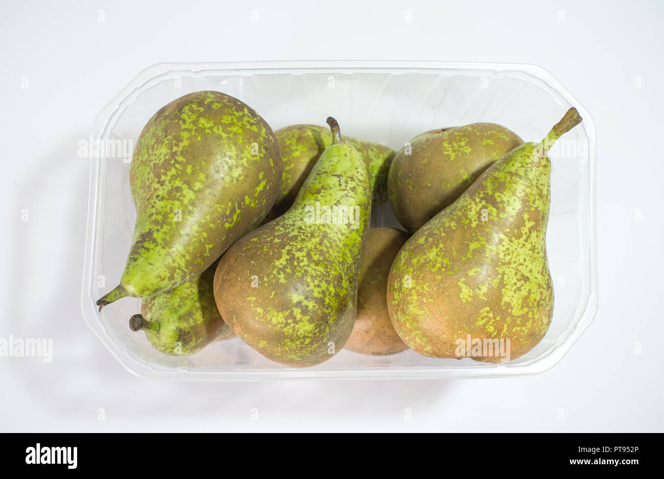 Conference pears on their plastic package. Uncovered Stock Photo