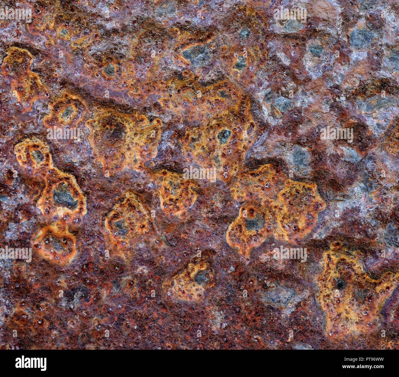 Backgrounds and textures: old rusty metal wall surface with dents, industrial abstract Stock Photo