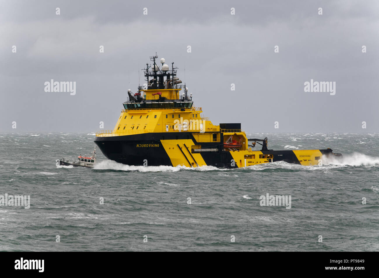 The Njord Viking High Ice-classed AHTS vessel capable of operations in harsh environment offshore seen taking approaching Aberdeen Harbour, Scotland Stock Photo