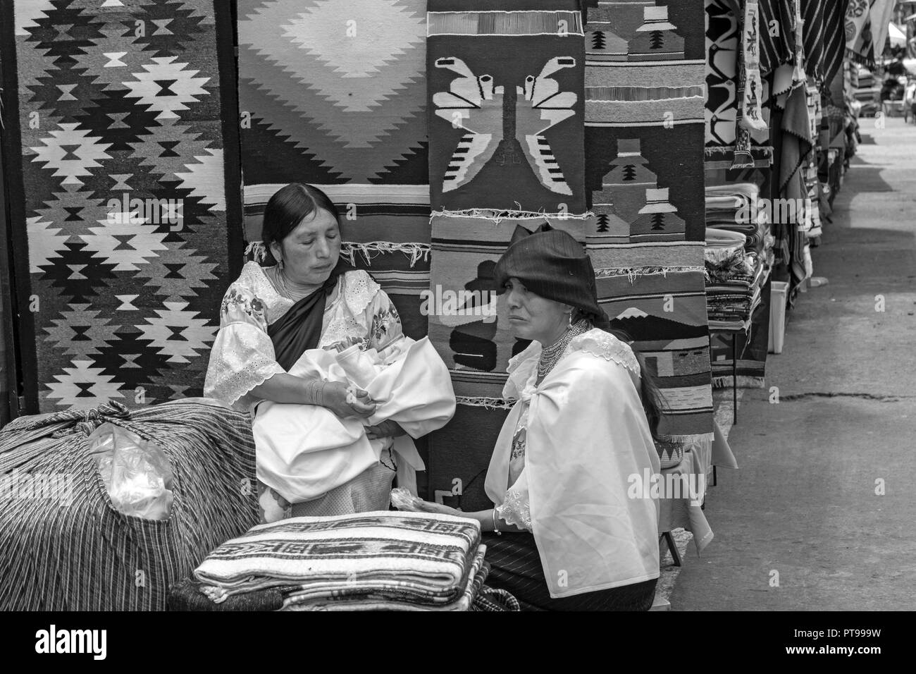 Otavalo market Ecuador - clothing + vendor Stock Photo