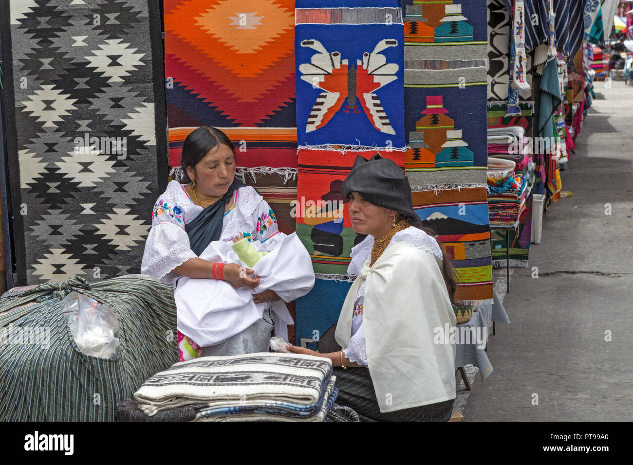 Otavalo market Ecuador - clothing + vendor Stock Photo