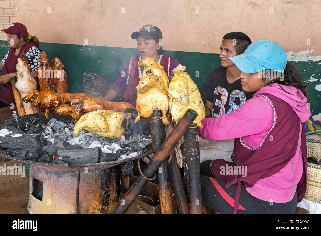 Guinea pigs BBQ, Gualaceo indoor market nr Cuenca Ecuador Stock Photo