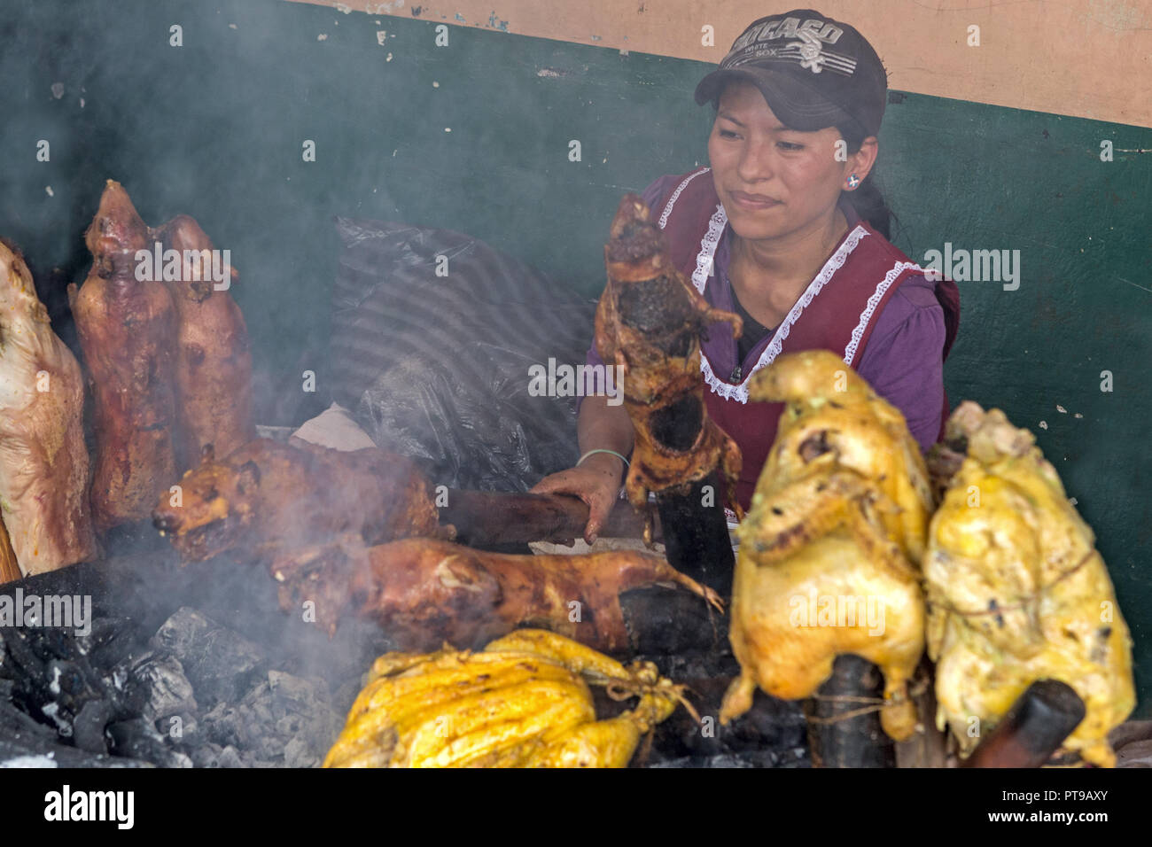 Guinea pigs BBQ, Gualaceo indoor market nr Cuenca Ecuador Stock Photo