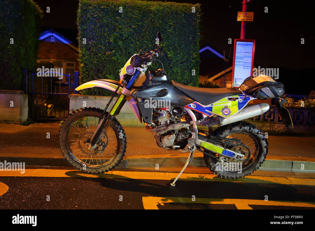 A police motor cross bike at the scene of a bus crash on Gibson Lane, in Kippax, West Yorkshire. Stock Photo
