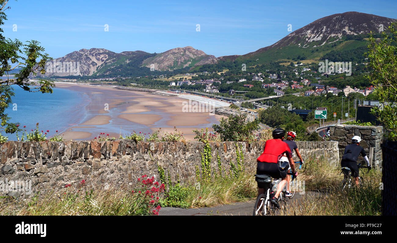 Penmaenmawr beach, as viewed from the cycle track between Llanfairfechan and Penmaenmawr. Image taken in June 2018. Stock Photo