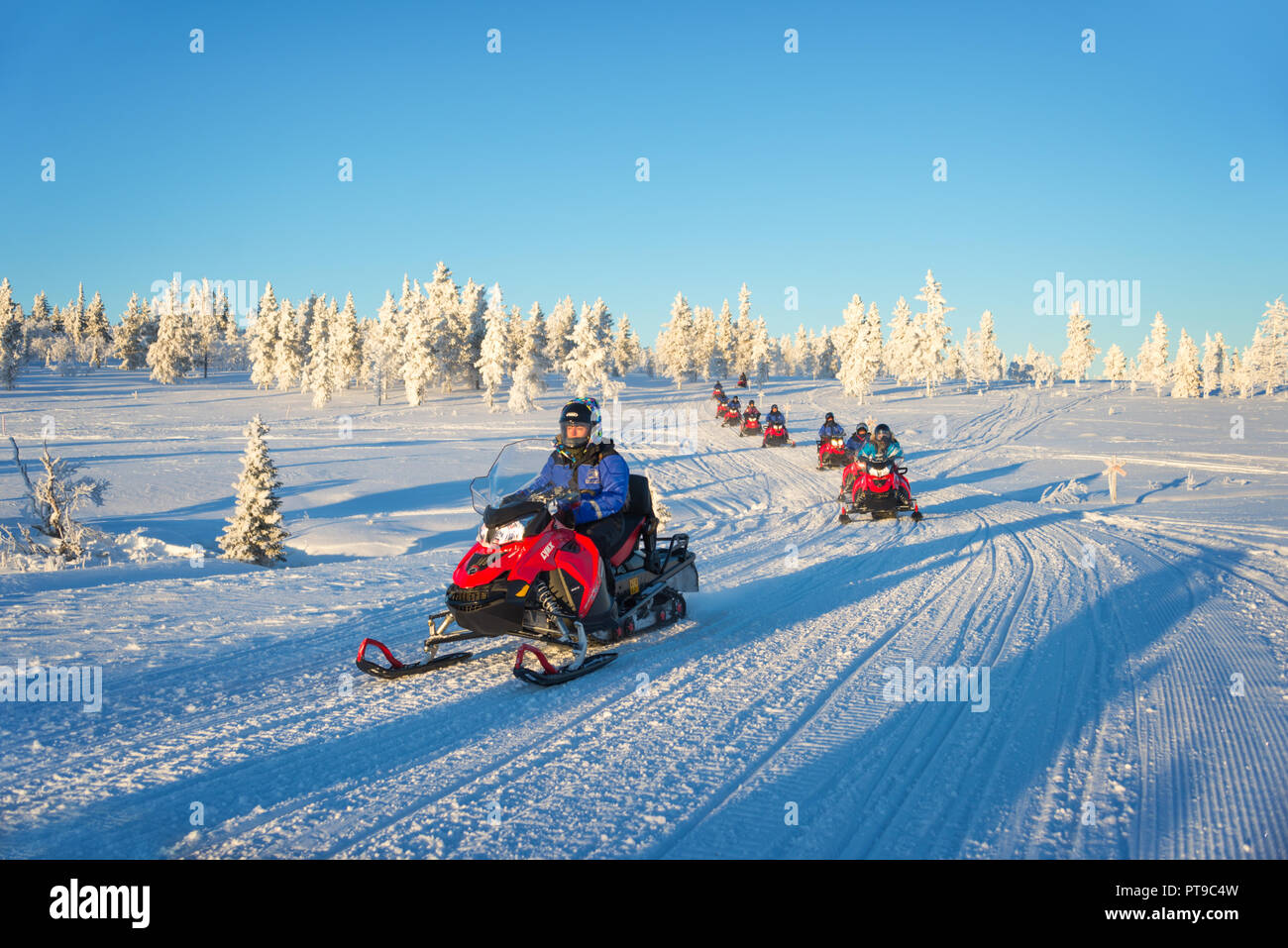 Group of snowmobiles in Lapland, near Saariselka, Finland Stock Photo