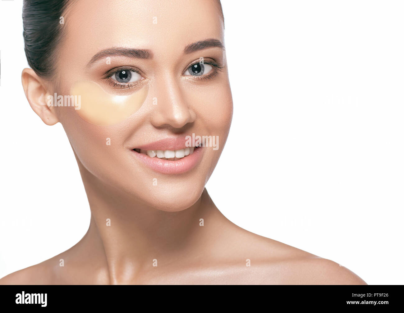 face with lifting eye patches moisturizing skin under the eyes Stock Photo