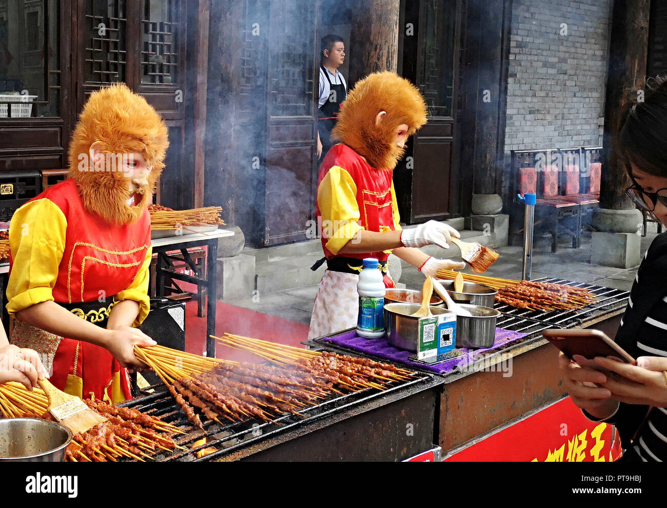 Chongqing Chongqing China 8th Oct 18 Chongqing China Two Men Wearing The Costume Of A A Eœmonkey Kinga A A Sells Barbecued Shish Kebab At A Scenic Area In Southwest Chinaa A A S Chongqing Credit Sipa Asia Zuma Wire Alamy Live