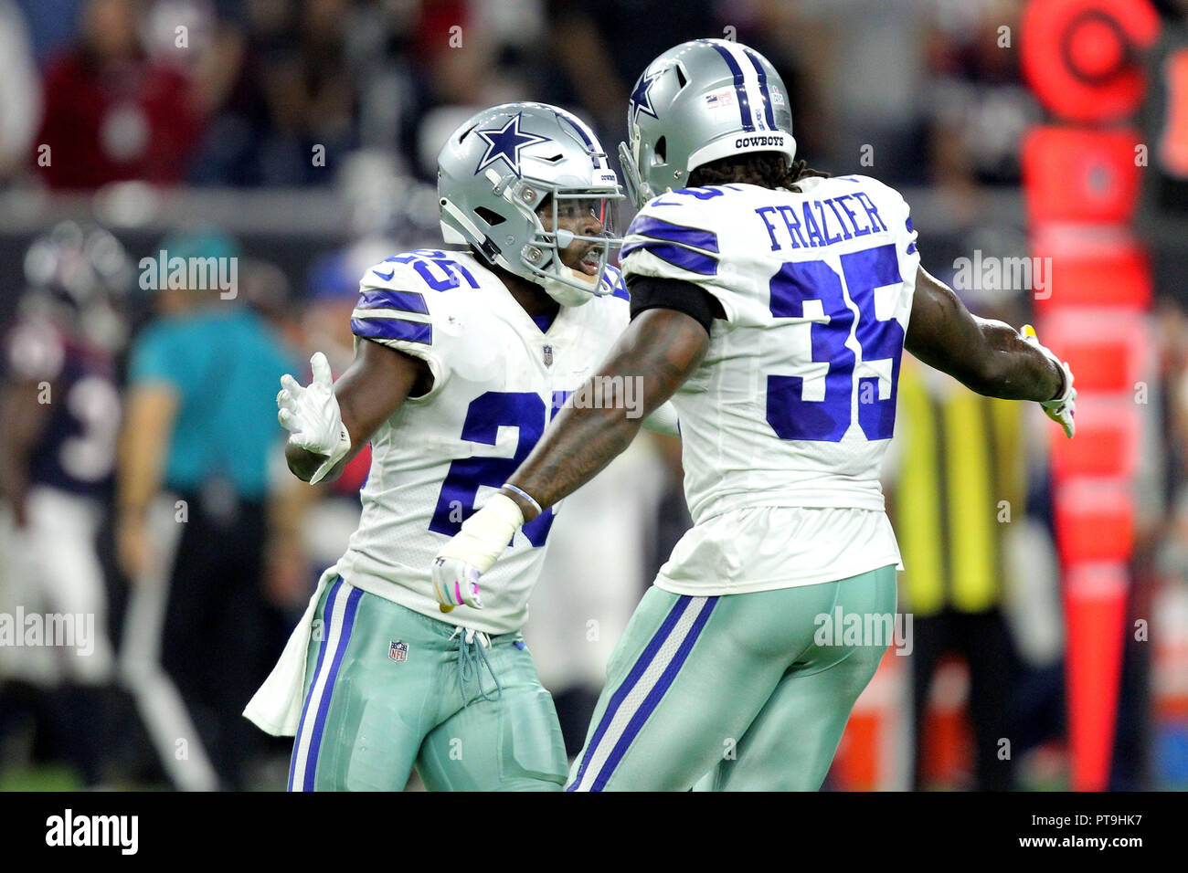 Houston, Texas, USA. 7th Oct, 2018. Dallas Cowboys defensive back Xavier Woods (25) and defensive back Kavon Frazier (35) celebrate a big play on defense during the fourth quarter of the NFL regular season game between the Houston Texans and the Dallas Cowboys at NRG Stadium in Houston, TX on October 7, 2018 Credit: Erik Williams/ZUMA Wire/Alamy Live News Stock Photo