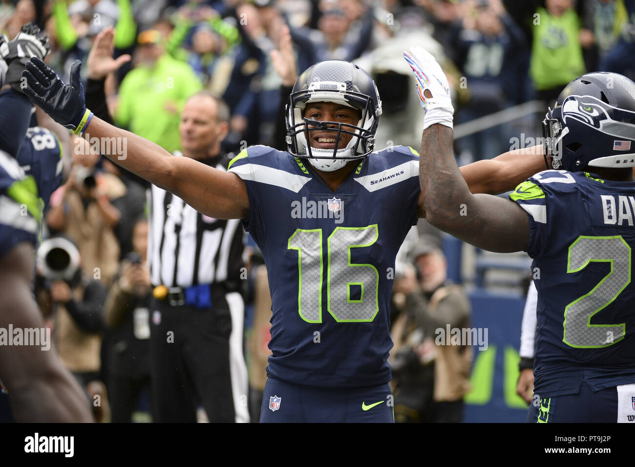 Seattle, Washington, USA. 7th Oct, 2018. TYLER LOCKETT (16) and the Seahawks celebrates a DAVID MOORE (83) touchdown. The Los Angeles Rams played the Seattle Seahawks in a NFC West game at Century Link Field in Seattle, WA. Credit: Jeff Halstead/ZUMA Wire/Alamy Live News Stock Photo