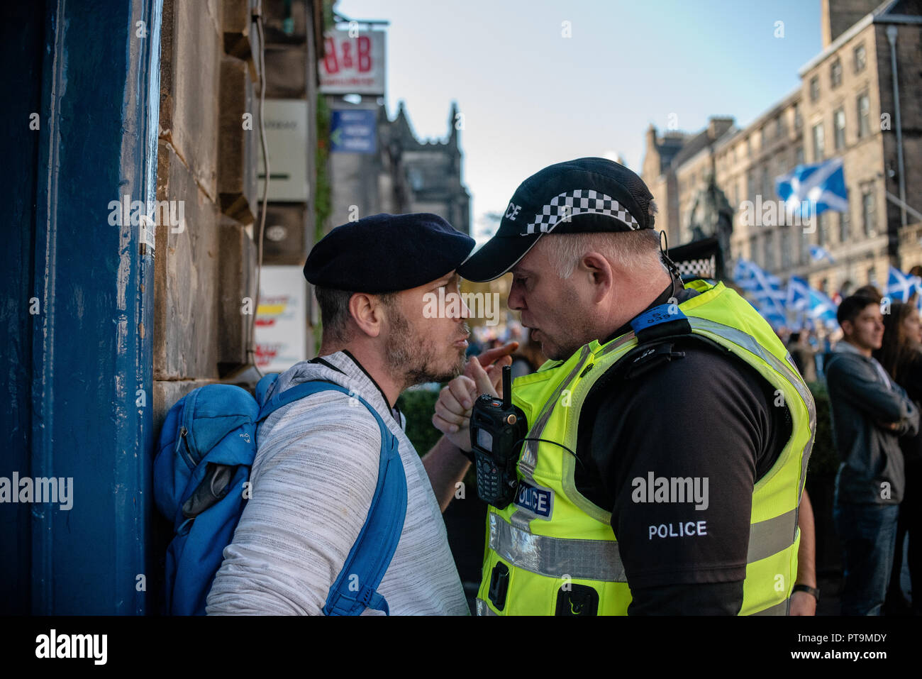 A member of the Pro-Union side is seen during a heated argument with a Police Scotland officer following a near physical altercation with a member of the Pro-Independence side.  Thousands of Scottish independence supporters marched through Edinburgh as part of the ‘all under one banner’ protest, as the coalition aims to run such event until Scotland is ‘free’. Stock Photo