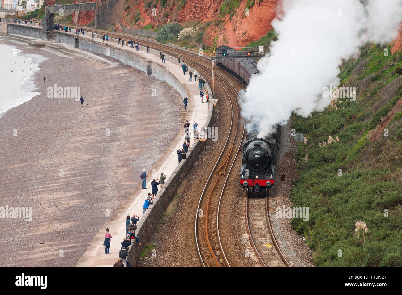 Dawlish, Devon, UK. 8th October, 2018. The Pacific Class Flying Scotsman 60103 and Stanier Black Five 44871 steam locomotives pull a train along the seafront at Dawlish, Devon, UK. Credit: Theo Moye/Alamy Live News Stock Photo