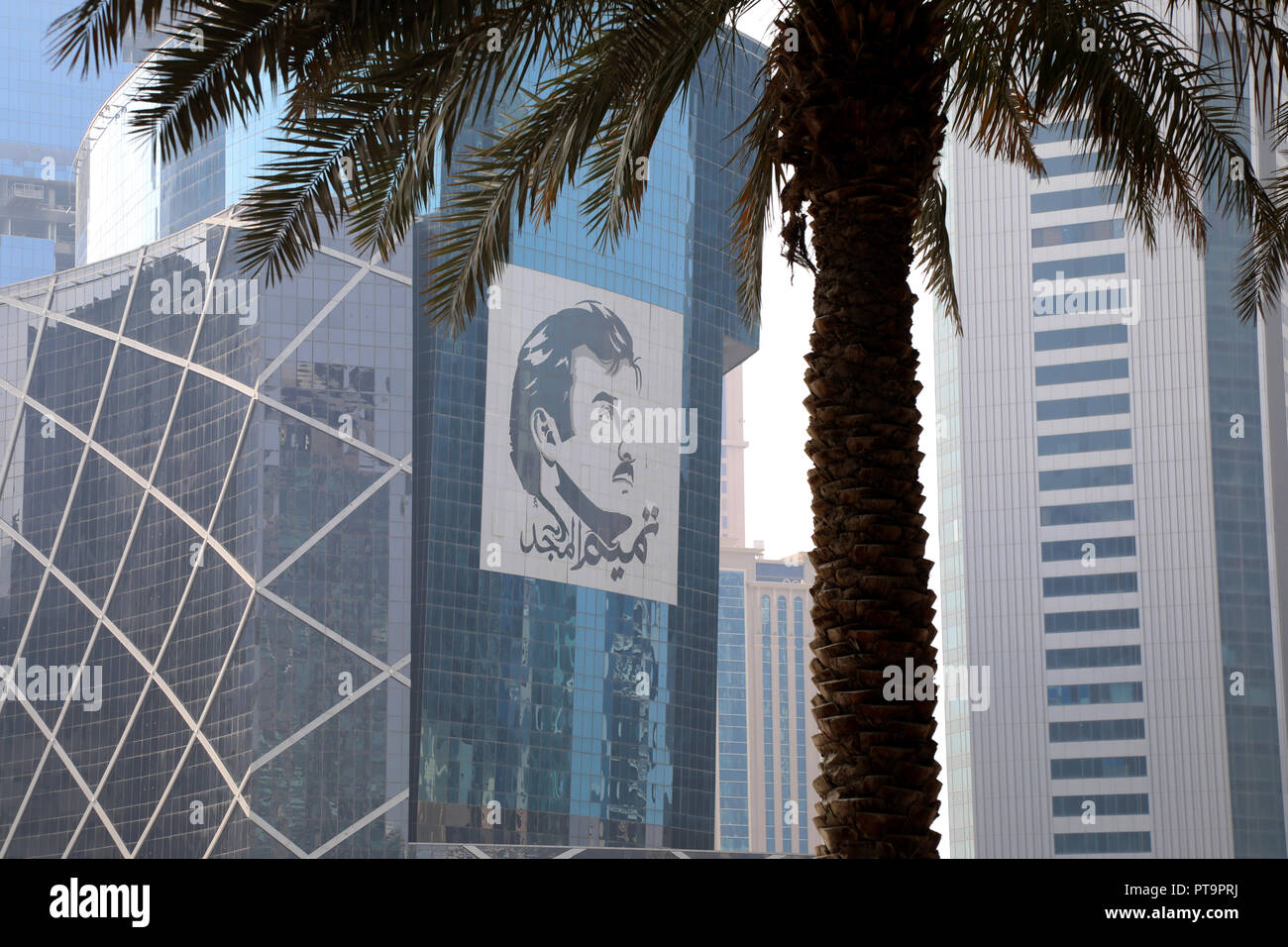 Doha / Qatar – October 8, 2018: A styalised image of Sheikh Tamim bin Hamad al Thani created by Ahmed Almaadheed on the side of a building in central Doha Stock Photo