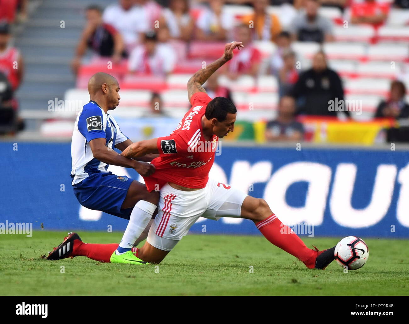 (181008) -- LISBON, Oct. 8, 2018 (Xinhua) -- Cristian Lema (R) of Benfica vies with Yacine Brahimi of Porto during the Portuguese League soccer match between SL Benfica and FC Porto at Luz Stadium in Lisbon, Portugal, Oct. 7, 2018. Benfica won 1-0. (Xinhua/Zhang Liyun) Stock Photo
