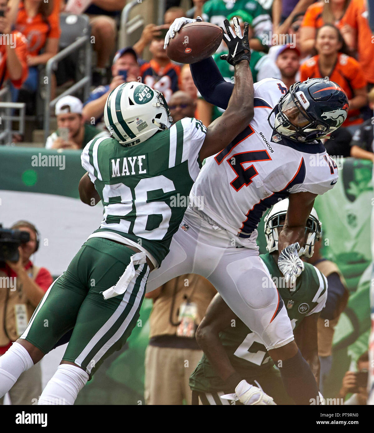 October 8, 2018 - East Rutherford, New Jersey, U.S. - New York Jets  defensive back Marcus Maye (26) breaks up a pass intended for Denver  Broncos wide receiver Courtland Sutton (14) in