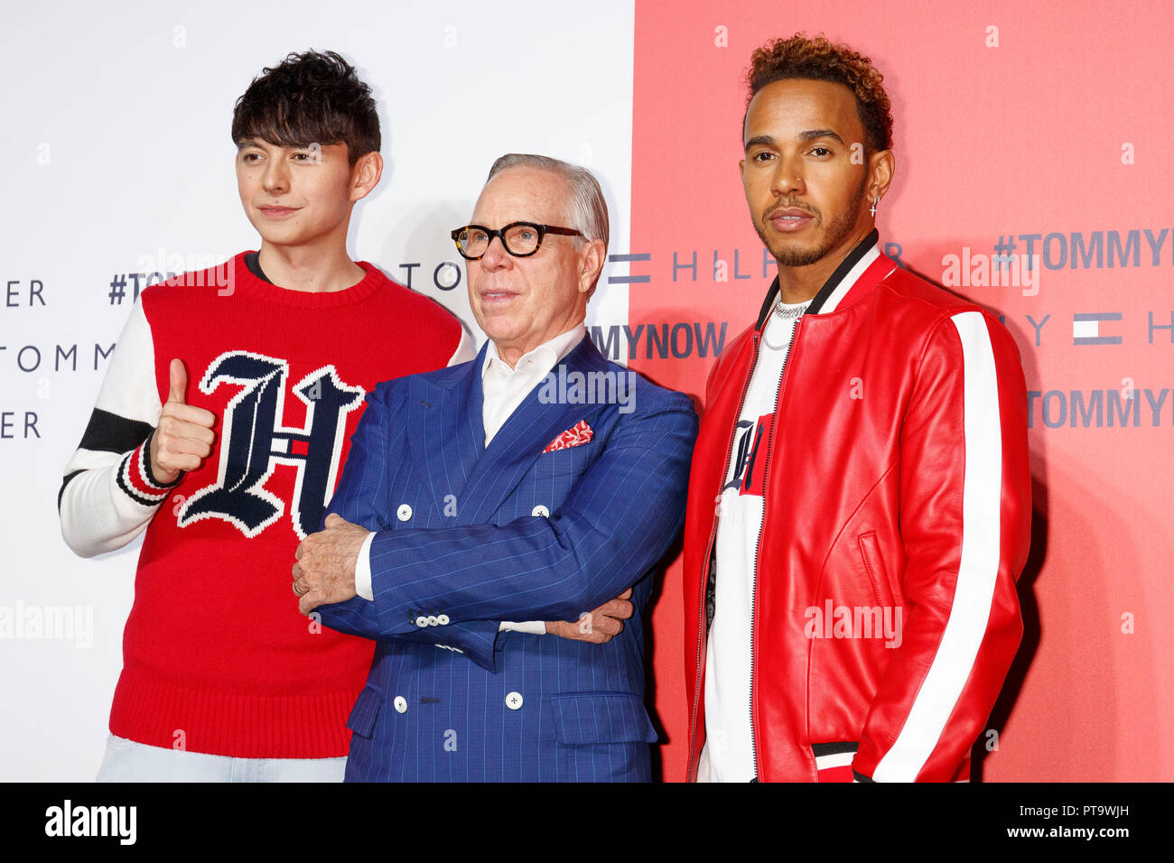 Tokyo, Japan. 8th October, 2018. (L to R) Japanese TV personality Harry  Sugiyama, American fashion designer Tommy Hilfiger and F1 racer Lewis  Hamilton pose for the cameras during Tokyo Icons event on