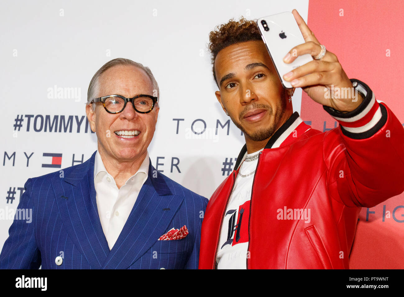 Tokyo, Japan. 8th October, 2018. (L to R) American fashion designer Tommy  Hilfiger and F1 racer Lewis Hamilton pose for a selfie during Tokyo Icons  event on October 8, 2018, Tokyo, Japan.