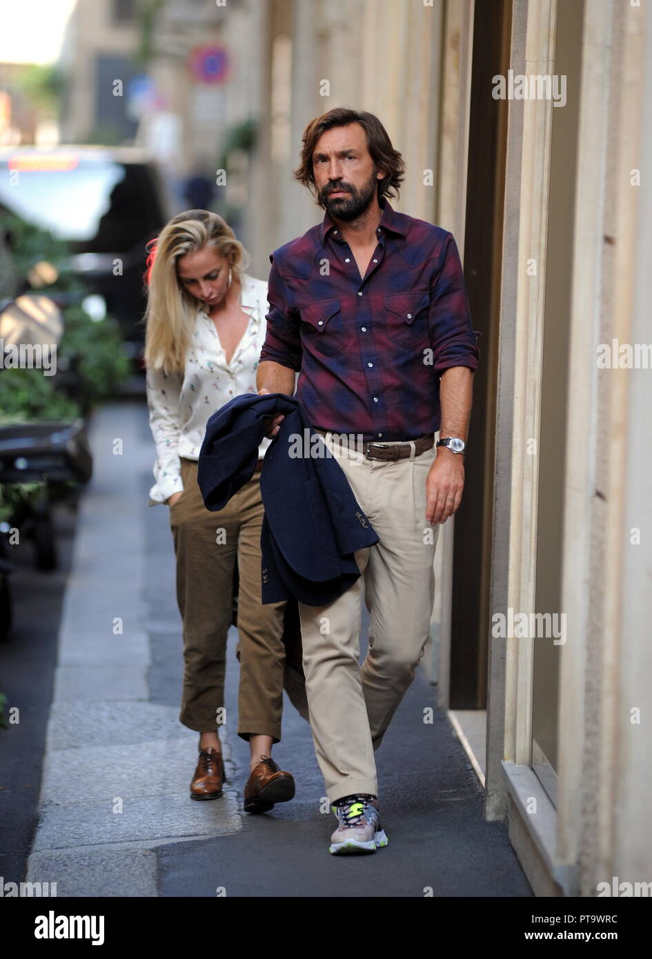 Milan, Andrea Pirlo and partner Valentina Baldini walking downtown Andrea  Pirlo, former Italian national Milan, Inter Juventus and lastly New York  City, has recently become one of the commentators of SKY. Here