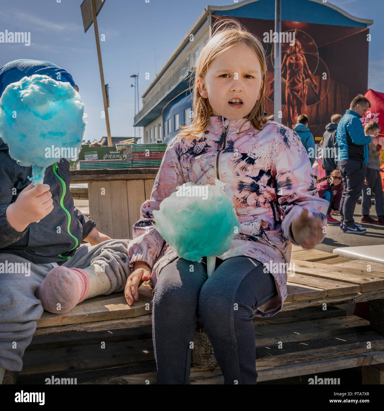 Children eating cotton candy, Seaman's Day, Reykjavik, Iceland. Stock Photo