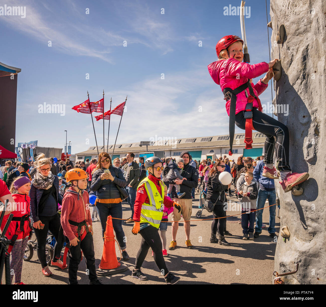 Children climbing, Summer Festival, Seaman's Day, (Sjomannadagurinn) Reykjavik, Iceland Stock Photo
