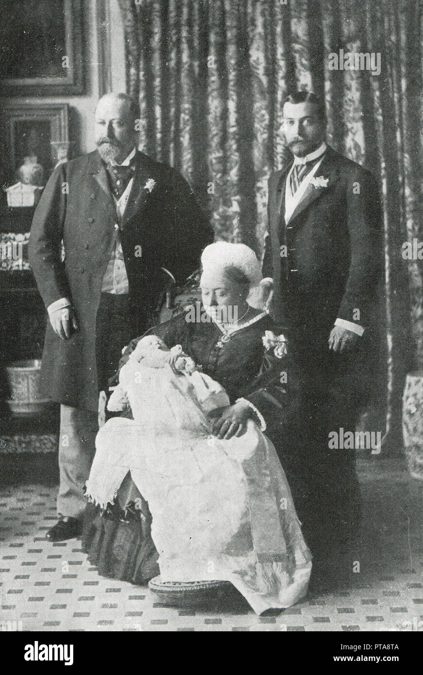 4 generations of Queen Victoria's family, 16 July 1894, on the occasion of the baptism of the eldest child of the Duke of York.  Queen Victoria with what would be the next 3 British monarchs, Edward VII, George V, and Edward VIII, 3 royal houses, house of Hanover, house of Saxe-Coburg and Gotha, and the house of Windsor Stock Photo