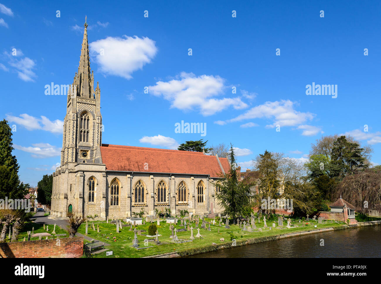 Marlow, England, UK - April 18, 2015: The traditional gothic parish church of All Saints stands on the banks of the River Thames at Marlow in England' Stock Photo