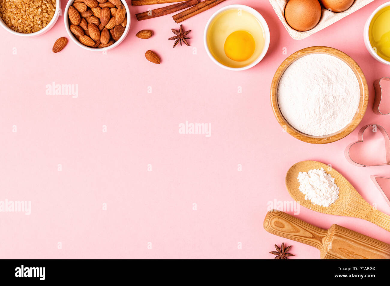 Ingredients and utensils for baking on a pastel background, top view ...