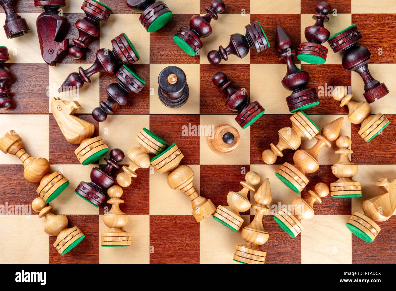An overhead photo of a checkmate situation in chess with nearly all the ...