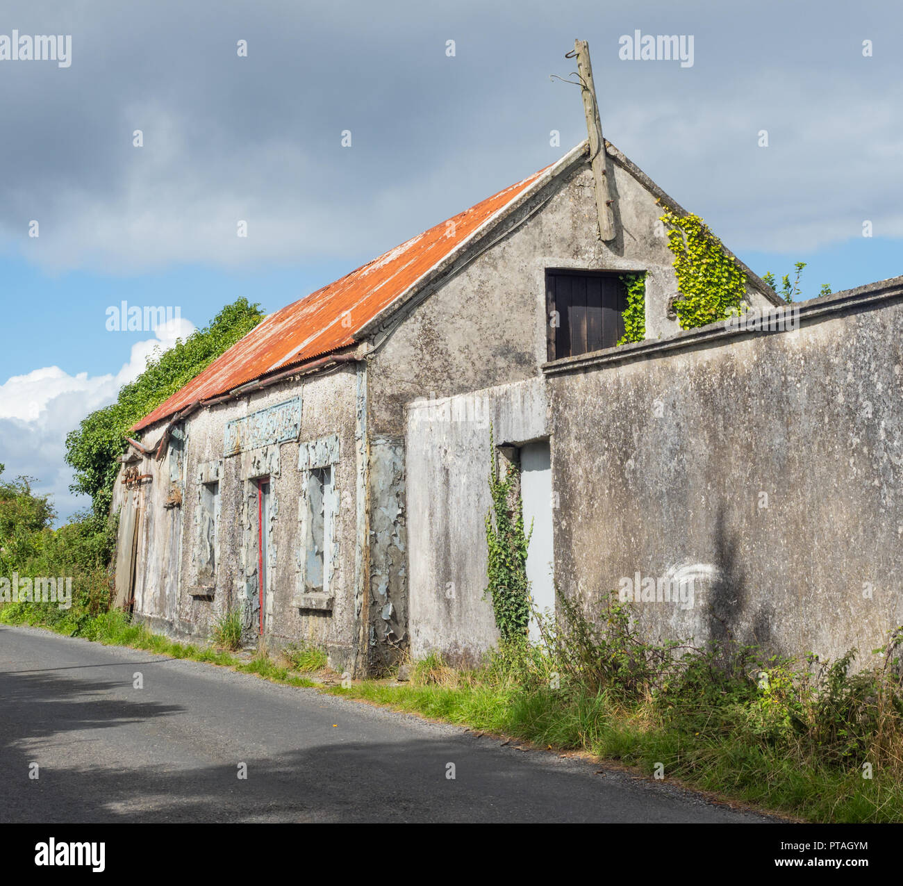 The abandoned Hannon's Stores building next to a country road near Headford, in County Galway, Ireland. Stock Photo