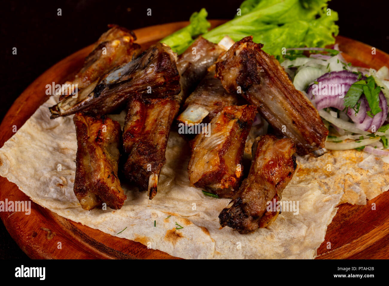 Grilled Mutton ribs with onion Stock Photo Alamy