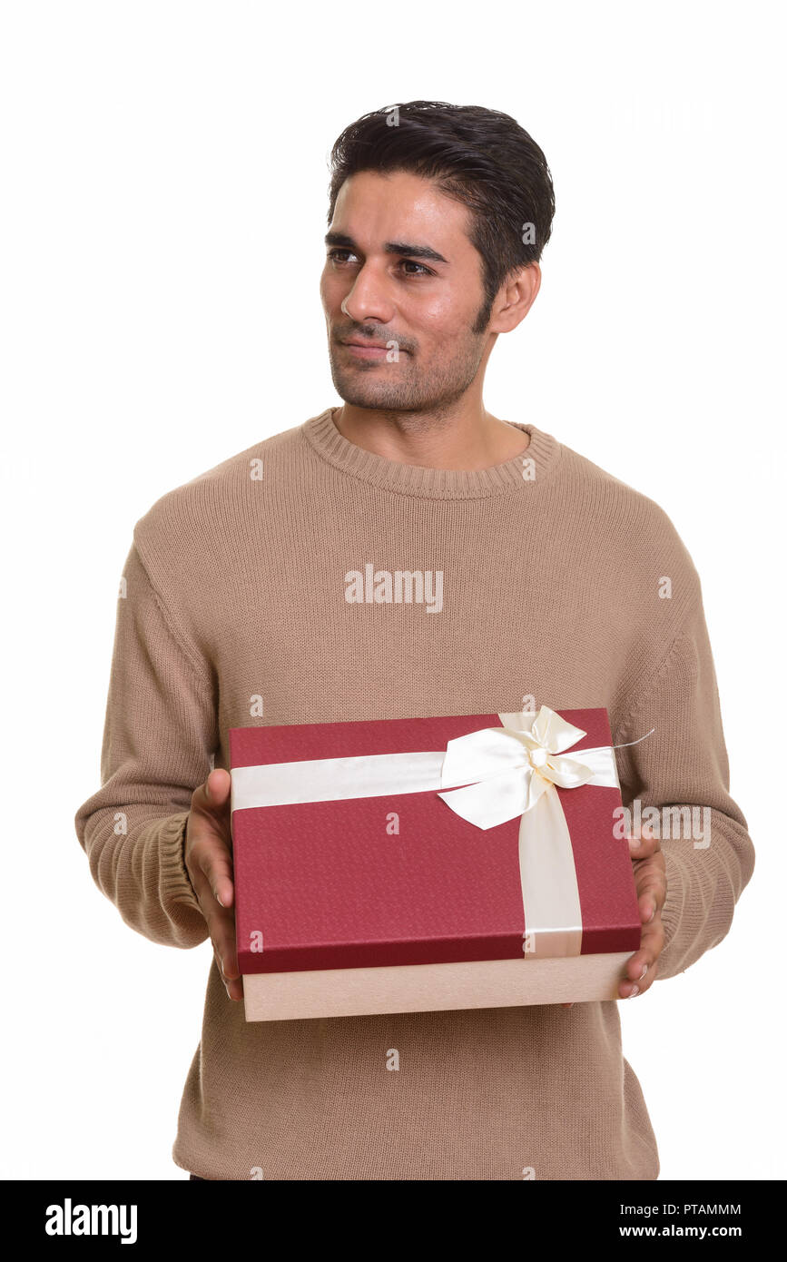 Young handsome Persian man against white background Stock Photo - Alamy