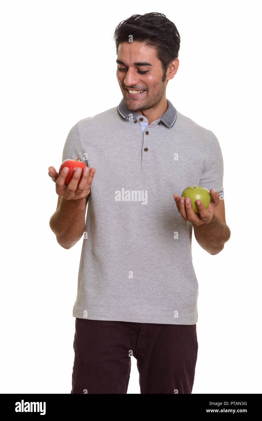 Young handsome Persian man against white background Stock Photo - Alamy