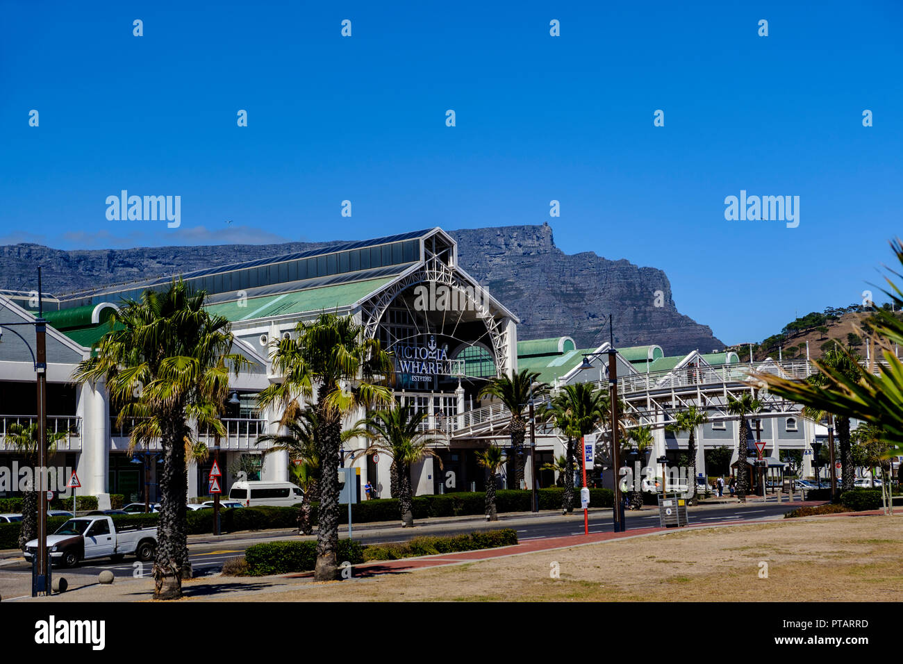 CAPE TOWN, SOUTH AFRICA – 20 MARCH 2018: Victoria Wharf shopping mall on V&A Waterfront of Cape Town South Africa with dramatic backdrop of Table Moun Stock Photo