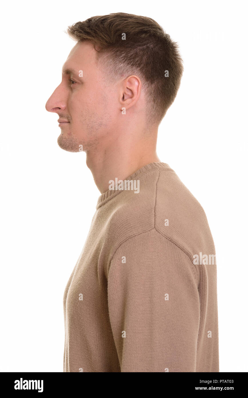 Handsome Caucasian man isolated against white background Stock Photo