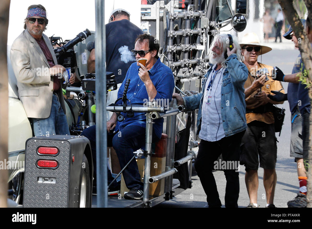 Quentin Tarantino is seen the set of 'Once Upon a Time In Hollywood' on the Burbank Boulevard on October 6, 2018 in Burbank, California. Stock Photo
