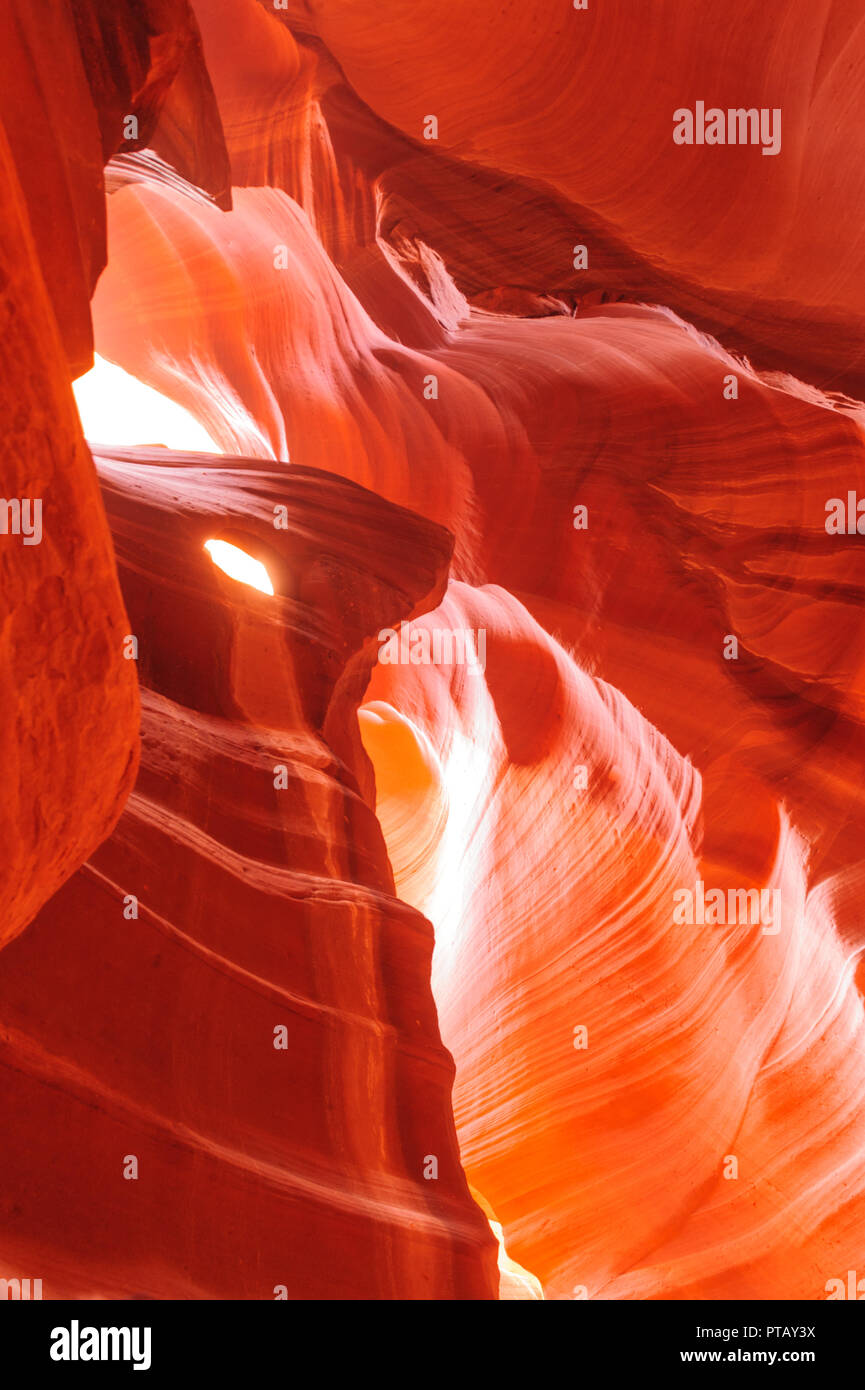 The interior of the narrow walls of the winding Antelope Canyon in ...