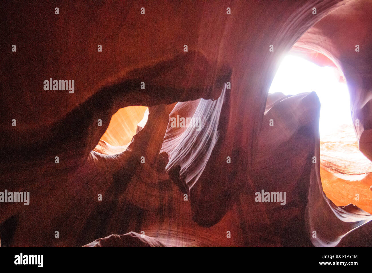 The interior of the narrow walls of the winding Antelope Canyon in ...
