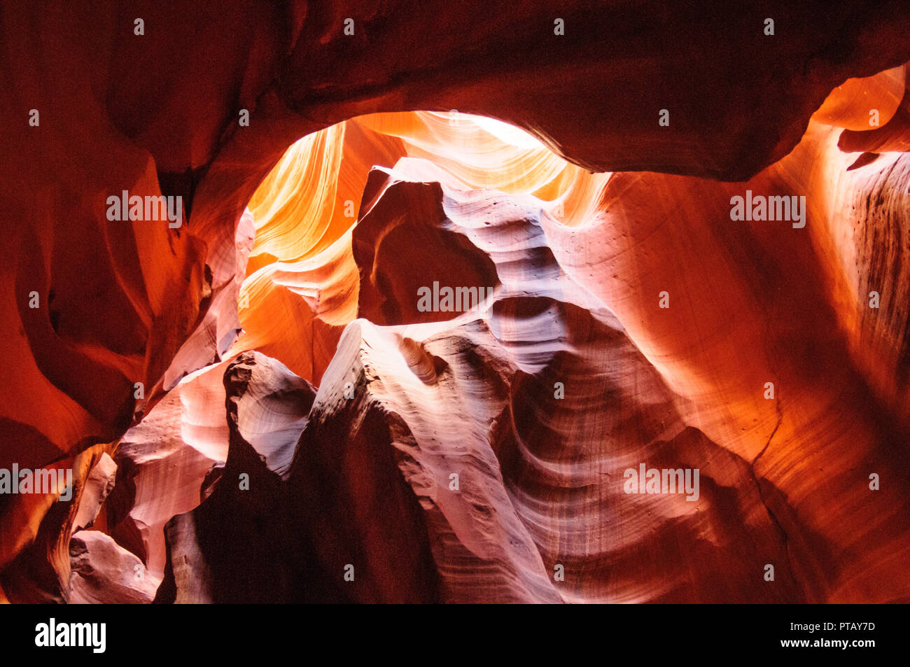 The interior of the narrow walls of the winding Antelope Canyon in ...