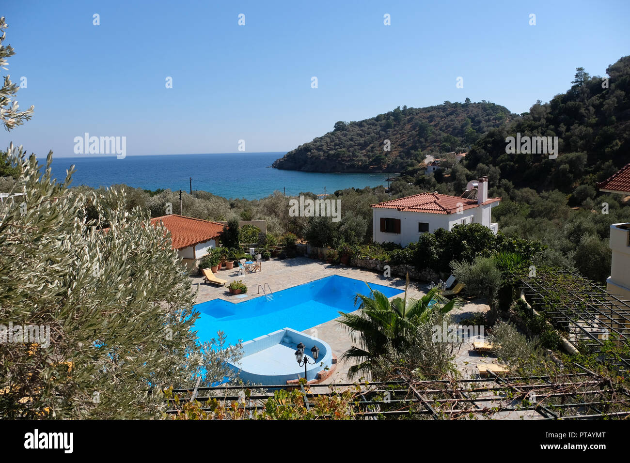 Assos village Mediterranean Sea, Greece. Summer vacation on Greek Island.  by Igor Tichonow. Photo stock - StudioNow