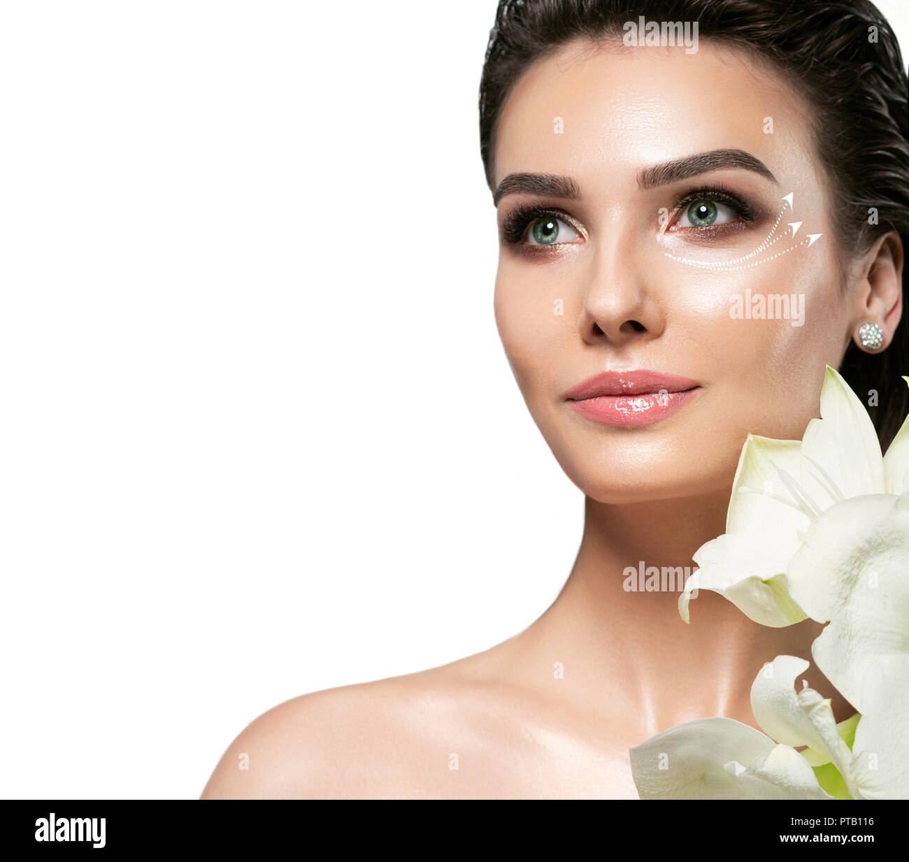 face with lifting arrows on skin showing rejuvenation skin around eye Stock Photo