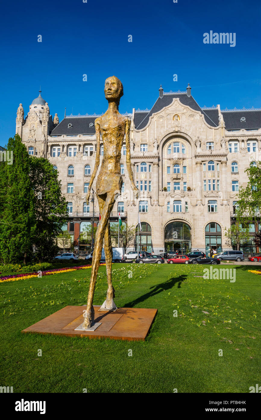 Budapest, Girl from Buda statue by Eran Shakine, behind Four Seasons Hotel Gresham Palace Stock Photo