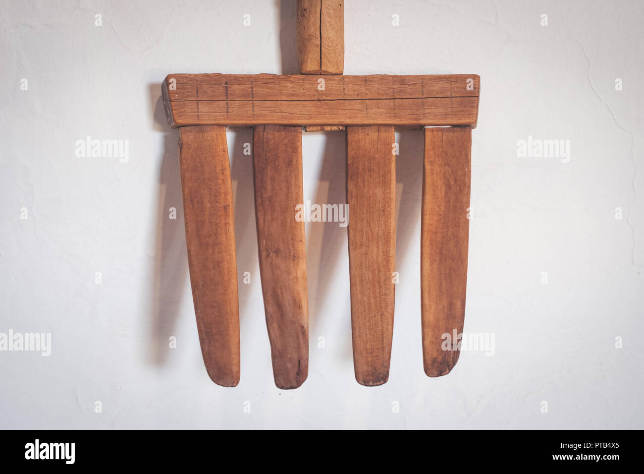 old wooden fork /  antique pitchfork Stock Photo