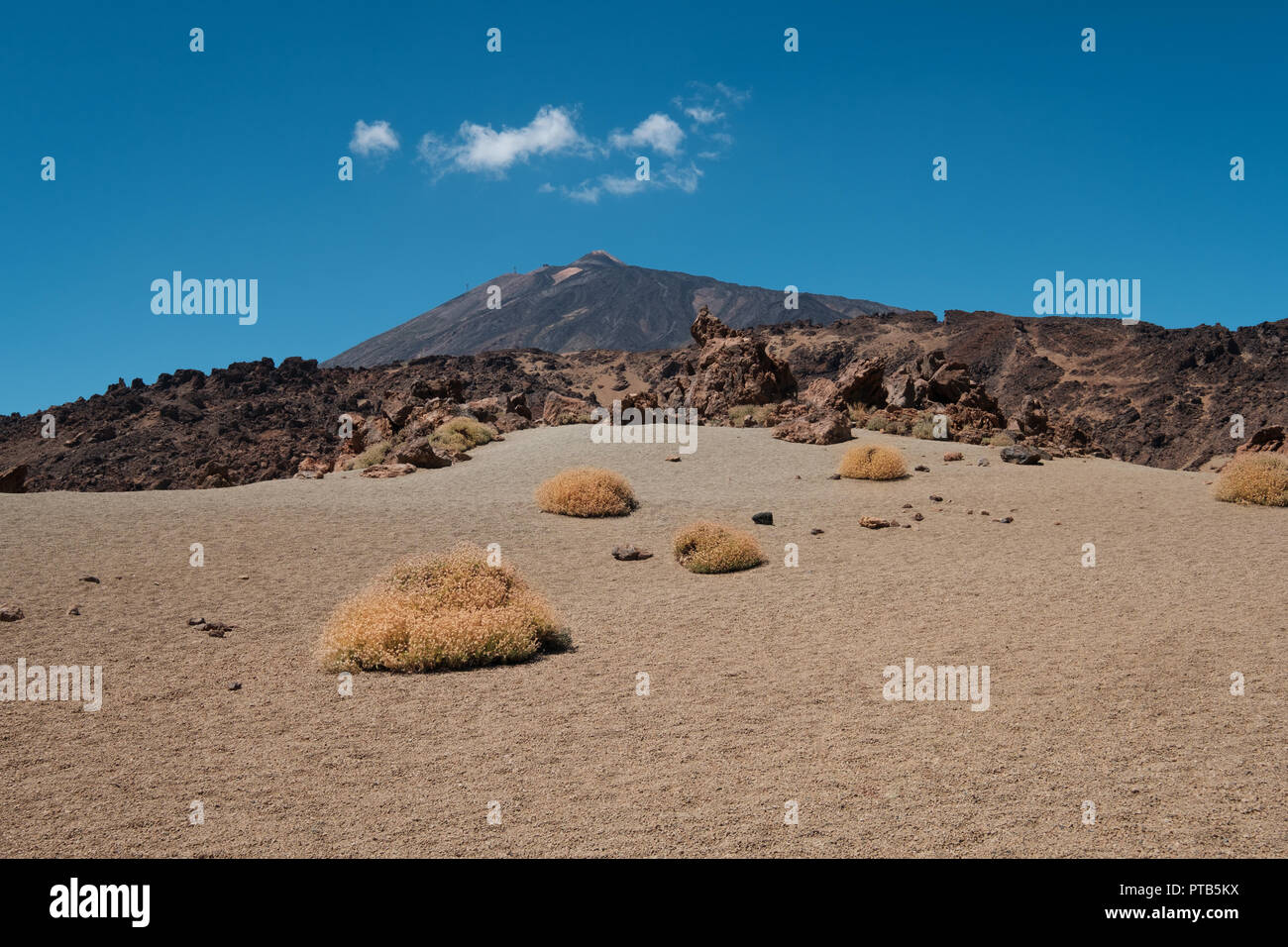 desert landscape and mountain peak view from volcanic crater, pico del Teide, Tenerife - Stock Photo